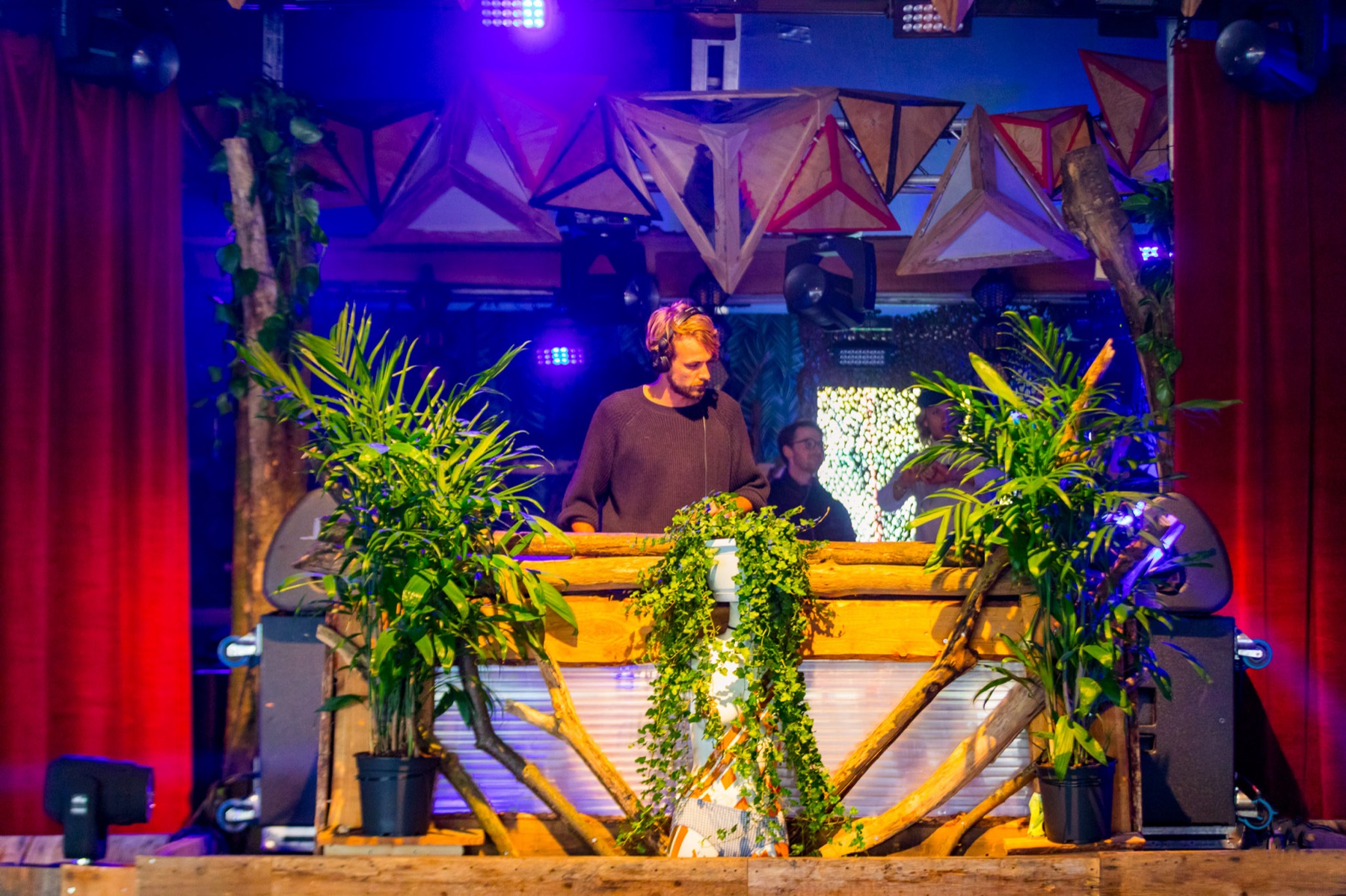 Space Kadett on a plant-covered stage at Into the Woods